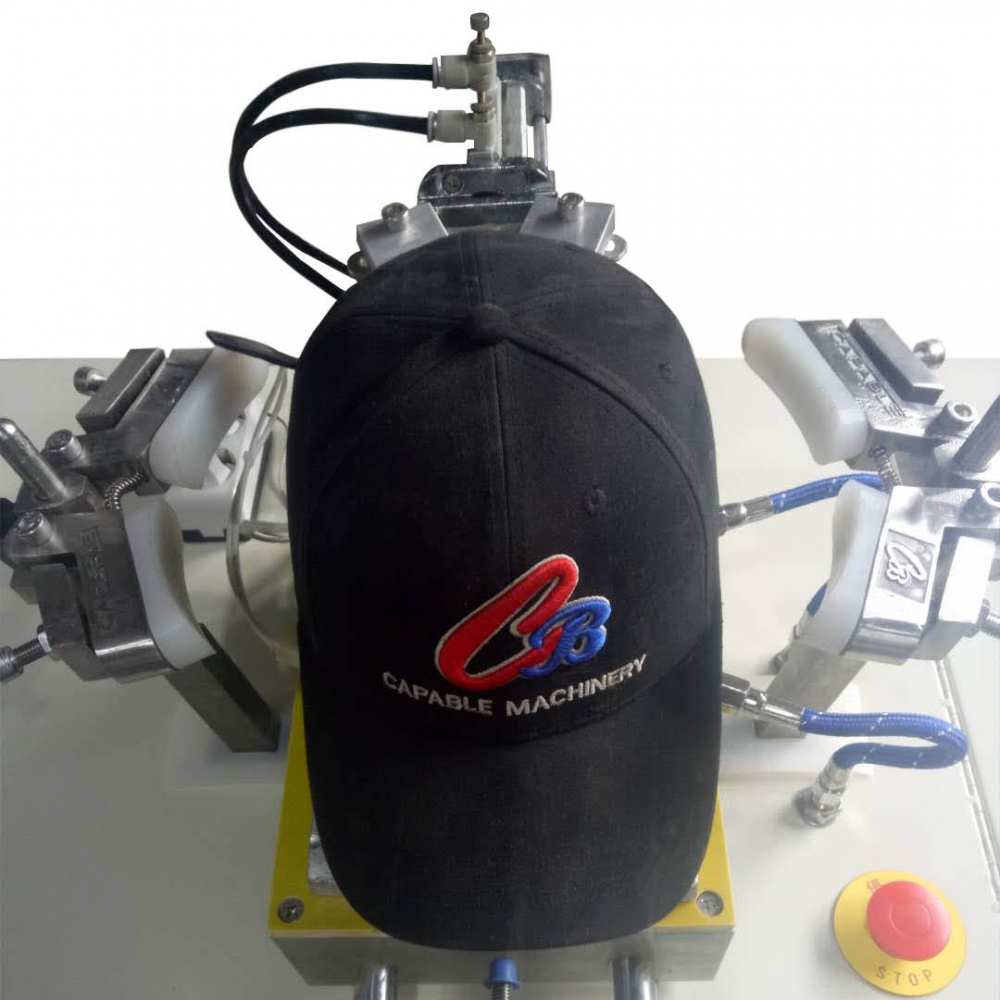 Cap ironing M/C-single head
